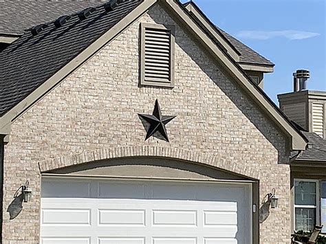 what does the metal stars on houses mean|outdoor barn star on house.